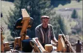  ?? PHOTO BY RICHARD PECHNER. ?? Nog Johnson on his backhoe working on Richie Pechner’s barn on Cameron Road in May 1975.