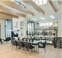  ??  ?? Beams add visual interest to the soaring ceilings above the dining area in the latest Foothills Hospital Home Lottery grand prize.