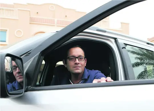  ?? Ravindrana­th K / The National ?? Omar Ghazanfar, an Abu Dhabi doctor, is currently looking at a higher quotation for his car insurance despite the vehicle’s value having depreciate­d.