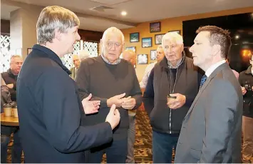  ?? ?? Opposition leader Matthew Guy (right) is told about the desperate need for more infrastruc­ture in the Warragul and Drouin growth areas by mayor (from left) Michael Leaney, Stuart Lawson and Michael Daniels.