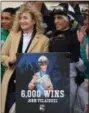 ?? PHOTO SUSIE RAISHER/NYRA ?? Jockey John Velazquez celebrates his 6,000th career victory in the Aqueduct Race Course winner’s circle Friday afternoon after bringing Singapore Trader across the line first.