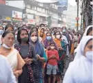  ?? R S IYER/AP FILE ?? Indian Christians wearing masks gather for prayers as they observe Palm Sunday in Kochi, Kerala state, India, April 10.
