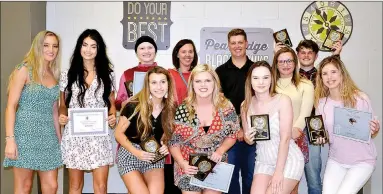  ?? TIMES photograph by Annette Beard ?? The Blackhawk cheerleade­rs were awarded by coach Courtney Hurst at the spring awards ceremony Tuesday, May 14. Nicole Turner was named Most Valuable Player.