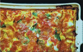  ?? COURTESY OF LYNDA BALSLEV ?? This hearty lasagna is layered with three cheeses, a meaty tomato sauce and — wait for it — kale.