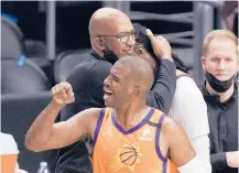  ?? MARK J. TERRILL/AP ?? Coach Monty Williams hugs Jae Crowder, while Chris Paul celebrates late in the Suns’ 130-103 series-clinching win over the Clippers on Wednesday night.