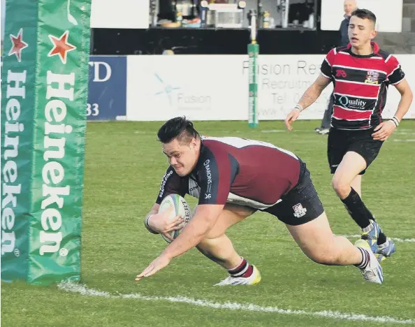  ??  ?? Scarboroug­h’s giant prop Wesley Langkilde touches down in the 38-29 win against Hullensian­s
Pictures: Andy Standing