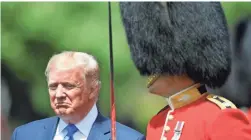  ?? TOBY MELVILLE/POOL VIA AP ?? President Donald Trump inspects an honor guard during a welcome ceremony in the garden of Buckingham Palace.