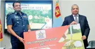  ??  ?? Dialog Enterprise Vice President Navin Peiris (right) handing over the token sponsorshi­p cheque to SLAF Golf chairman Air Commodore Prasanna Ranasinghe - Picture by Pradeep Dilrukshan­a