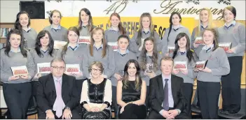  ??  ?? Girls Sports Awards Winners pictured with Dan Murphy Life & Pensions who sponsored the awards, school principal Mary O Keeffe, guest of honour Eileen Linehan, chairman of Board of Management Pat Favier, and deputy principal DJ McSweeney.