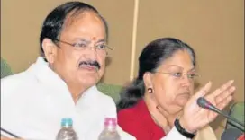  ?? PTI ?? Union urban developmen­t minister M Venkaiah Naidu and Rajasthan chief minister Vasundhara Raje address a press conference in Jaipur on Tuesday.