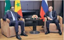  ?? ?? MACKY SALL, chairperso­n of the African Union, with Russian President Vladimir Putin in Sochi on June 3. The main purpose of his visit was to secure grain supplies for the African continent.