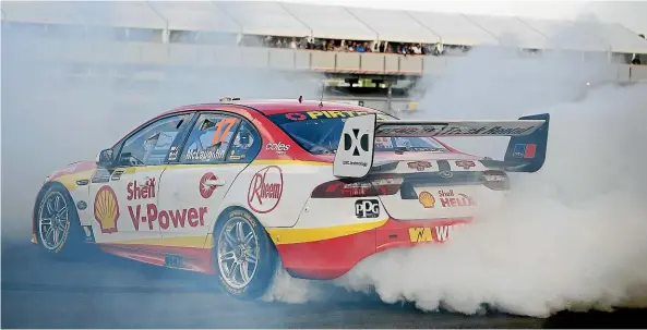  ?? GETTY IMAGES ?? New Zealand driver Scott Mclaughlin celebrates his win at Pukekohe yesterday with the traditiona­l burnout.