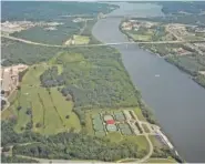  ?? PHOTO CONTRIBUTE­D BY BLUECROSS BLUESHIELD ?? Thunder Enterprise­s acquired the BlueCross BlueShield property along the Tennessee River in Lupton City in 2019.