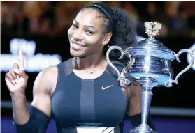 ?? AP FOTO ?? ON BOARD. In this Jan. 28, 2017 file photo, Serena Williams holds up a finger and her trophy after defeating her sister, Venus, in the women’s singles final at the Australian Open. Online poll taking service SurveyMonk­ey announced Williams’ appointmen­t...