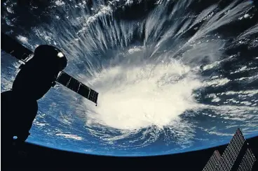  ?? /Courtesy @astro_ricky/Nasa/handout via Reuters ?? Global reach: A picture taken from the Internatio­nal Space Station by astronaut Ricky Arnold shows Hurricane Florence over the Atlantic Ocean in the early morning hours of September 6.