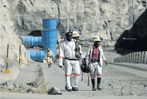  ?? Picture: Reuters ?? Workers return from a shift at Zimplats’ Ngwarati mine. Platinum producers with operations in Zimbabwe, such as Anglo American Platinum and Impala Platinum, which owns Zimplats, slowed production as the country’s economy stagnated, but now expect an era of renewed productivi­ty.