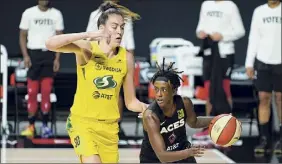  ?? Chris O'meara / AP ?? Las Vegas Aces guard Danielle Robinson drives around Seattle Storm forward Breanna Stewart in the first half of Game 3 of the WNBA Finals.