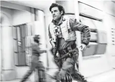  ??  ?? Star pilot Poe Dameron (Oscar Isaac) rushes into the fight.