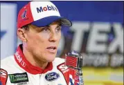  ?? BRIAN LAWDERMILK / GETTY IMAGES ?? After winning Sunday at Texas Motor Speedway, Kevin Harvick’s car failed inspection because of an illegally modified spoiler.