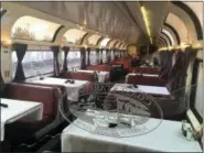  ?? NICOLE EVATT — THE ASSOCIATED PRESS ?? This Dec. 16, 2017 photo shows the dining car of Amtrak’s Cost Starlight train near Los Angeles. Chef-inspired meals, including steamed mussels and spicy chilaquile­s, are served in the dining car. Skip the hassles of traffic and airport security and hop on a coastal trek offering an old-fashioned, unplugged escape with scenic views of the Pacific Northwest. Seattle is the destinatio­n on Amtrak’s 35-hour Coast Starlight sleeper train, but the relaxing journey is the main attraction.