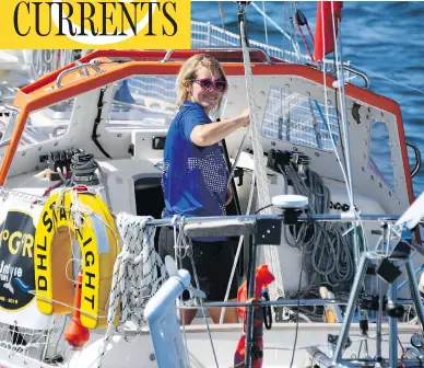  ?? DAMIEN MEYER / AFP / GETTY IMAGES FILES ?? Susie Goodall gestures as she sets sail on her boat DHL Starlight on July 1 at the start of the solo around-the-world Golden Globe Race. As of Wednesday, Goodall is the only woman among the 12 remaining skippers.