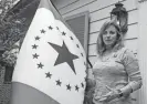  ?? EMILY WAGSTER PETTUS/AP ?? Laurin Stennis, an artist, speaks April 17,
2019, about the flag she designed, which flies next to her.