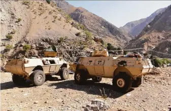  ?? Jalaluddin Sekandar / Associated Press ?? Military vehicles are stationed in the Panjshir Valley last month. The Taliban say they have seized control of Panjshir province, a region north of Kabul that had opposed militants’ rule.