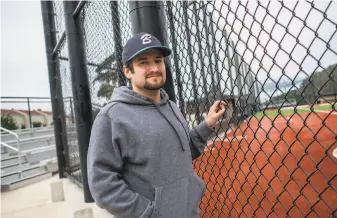  ?? Nick Otto / Special to The Chronicle ?? Daniel Rathman is a high school registrar and baseball coach in San Francisco who plays in and helps run the fantasy National Pastime League, which has 23 teams around the United States.