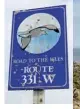  ??  ?? A road sign for part of the highway that connects some of Newfoundla­nd’s 7,000 islands; the Lion’s Den trail on Fogo Island (right)