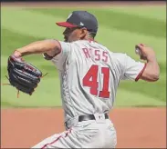  ?? Dilip Vishwanat / Getty Images ?? Joe Ross of the Nationals allowed four hits, struck out five and walked one in six innings against the Cardinals on Wednesday. The Nationals won 6-0.