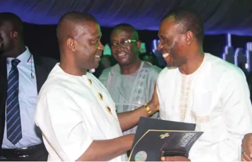  ??  ?? L-R: Managing Director of NDDC, Mr. Nsima Ekere, NDDC Chairman, Senator Victor Ndoma-Egba and Minister of the Niger Delta, Pastor Usani Uguru Usani, at the Thanksgivi­ng Service in honour of Ekere held at the Methodist Church Ikot Abasi Diocese