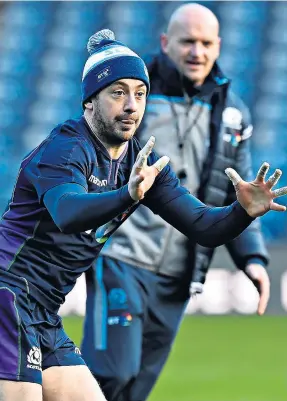  ??  ?? Eyes on the task: Greig Laidlaw trains as his coach Gregor Townsend looks on