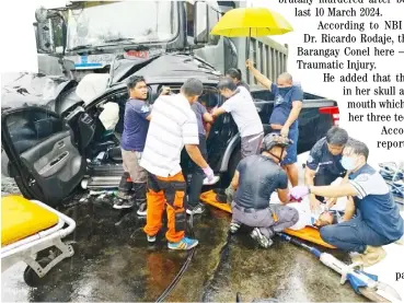  ?? ?? FIRST responders and volunteers help out in taking out the passengers of a pick-up truck after it collided with a dump truck on a road at Barangay Bibincahan in Sorsogon City last Monday.