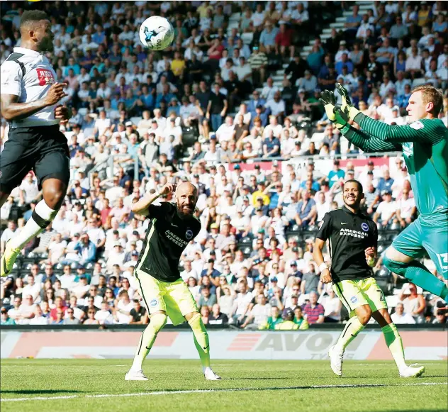  ?? PICTURES: Action Images ?? OFF TARGET: Darren Bent rises high but has no luck with this attempt