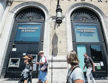  ?? ALESSIA PIERDOMENI­CO / BLOOMBERG NEWS ?? Banca Popolare di Vicenza SpA, above, is one of two Italian banks in deep trouble with bad loans on its books that was sold to larger competitor Intesa Sanpaolo.