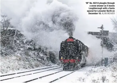  ?? ALAN WEAVER ?? ‘9F’ No. 92214 ploughs through a snow shower as it leaves Loughborou­gh with a Santa special for Leicester North on December 10.