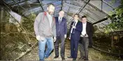  ?? (Photos C.T.) ?? Didier Guillaume, accompagné notamment du président du Départemen­t Charles-Ange Ginésy, dans une des serres de l’exploitati­on maraîchère de la famille Orso, dévastées par les inondation­s.