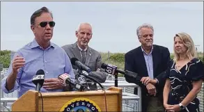  ?? John Moritz / Hearst Connecticu­t Media Group ?? Gov. Ned Lamont speaks at Hammonasse­t Beach State Park on Friday to open the start of the summer tourist season.