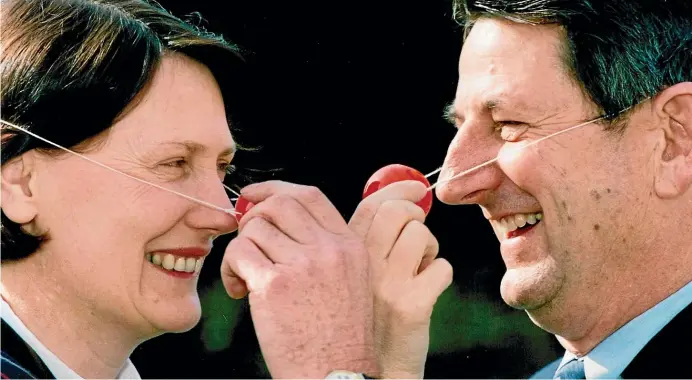  ?? STUFF ?? Bill Birch may have been a serious ‘‘undertaker-like figure’’ but that didn’t stop him sharing a humorous crossbench photo-call to celebrate 1993’s Red Nose Day with Helen Clark.