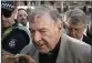  ?? ANDY BROWNBILL — THE ASSOCIATED PRESS FILE ?? In this Feb. 27, 2019, file photo, Cardinal George Pell arrives at the County Court in Melbourne, Australia.