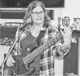  ?? ELIZABETH PATTERSON/CAPE BRETON POST ?? Dr. Susan Ritcey is a general practition­er based in Sydney who also likes to play bass and sing.