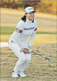  ?? Carmen Mandato Getty Images ?? HINAKO SHIBUNO, reacting on the 17th hole, shot a three-over 74 and still leads the U.S. Women’s Open by one.