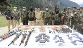  ?? — PTI ?? Senior Army and police officers display arms and ammunition­s recovered from multiple hideouts along the Line of Control in Rampur Sector of Jammu & Kashmir on Tuesday.