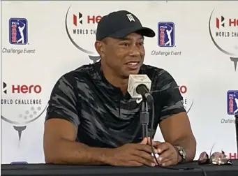  ?? AP ?? Tiger Woods holds his first press conference since his Feb. 23 car crash in Los Angeles at the Hero World Challenge golf tournament in Nassau, Bahamas, on Tuesday.