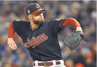  ?? KEN BLAZE, USA TODAY SPORTS ?? Corey Kluber, delivering in the first inning Tuesday, shut out the Cubs on four hits and had nine strikeouts over six innings to get the Game 1 win for the Indians.