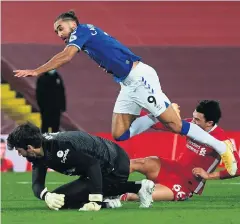  ??  ?? Game over: Everton’s Dominic Calvert-lewin is fouled by Liverpool’s Trent Alexandera­rnold, resulting in a penalty