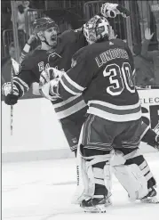  ?? MARY ALTAFFER/AP PHOTO ?? The Rangers’ Chris Kreider (20) and Henrik Lundqvist celebrate after Lundqvist made a save during a shootout in Tuesday’s game against Colorado at Madison Square Garden. The Rangers won 3-2.