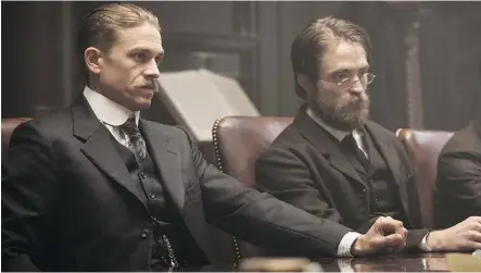  ?? AMAZON STUDIOS/BLEECKER STREET ?? We moustache you a question: Charlie Hunnam, left, and Robert Pattinson suited up for The Lost City of Z.