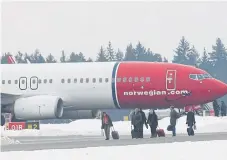  ?? /Reuters ?? Cold comfort: A Norwegian Air Shuttle Boeing 737800 aircraft on the tarmac of the Arlanda airport outside Stockholm, Sweden in February.