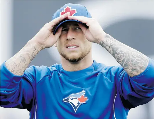  ?? MATT SLOCUM/ THE ASSOCIATED PRESS FILES ?? Blue Jays’ Brett Lawrie, shown during spring training in February, told Toronto GM Alex Anthopoulo­s he’s ‘ receptive’ to the move from third base.